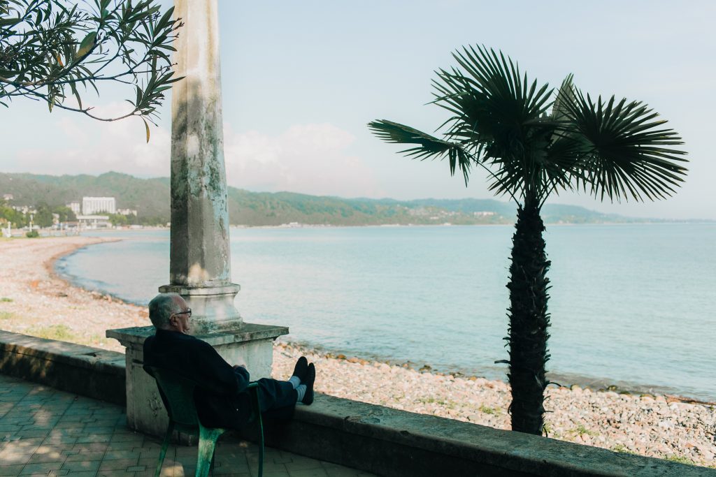Old man looking out to the sea